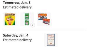 Amazon Cart with crayons, pencils, glue sticks, and a book